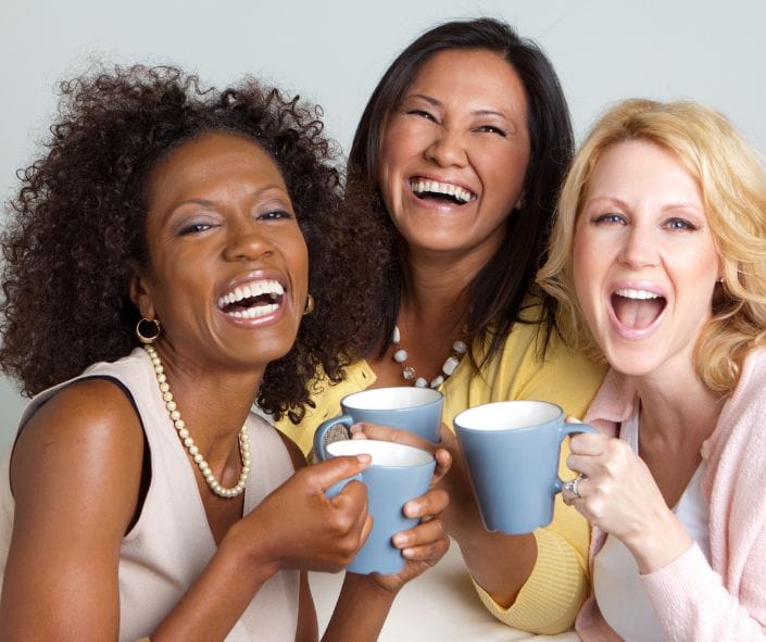 3 women smiling and sharing over tea; build confidence, networking, career change, career path_Twanna Carter; resilience