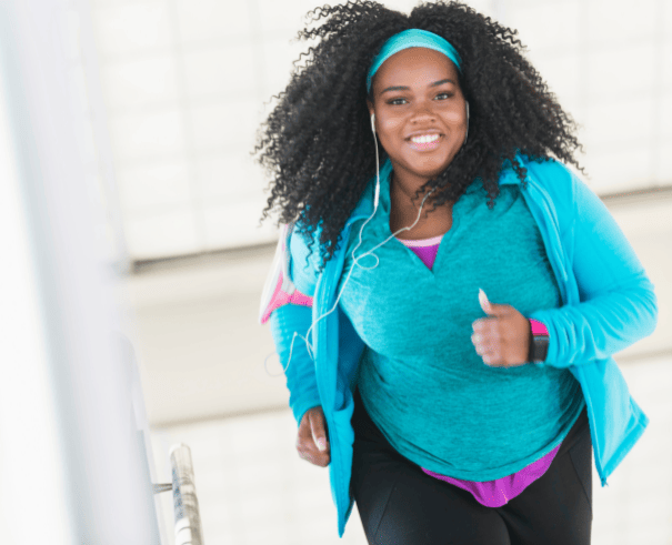 Black woman exercising;
career success, work life balance, mental fitness