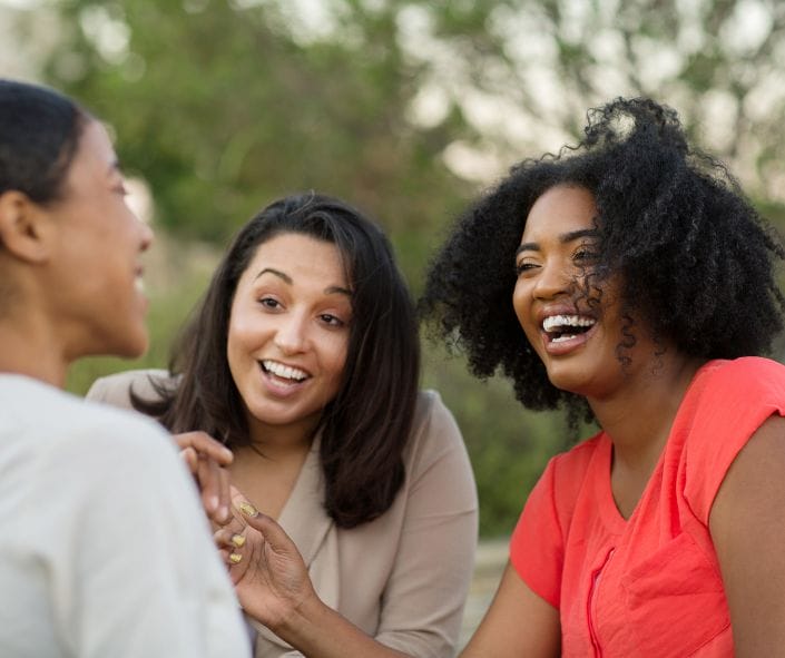 3 women smiling and talking;  networking, career change, career pivot_Twanna Carter