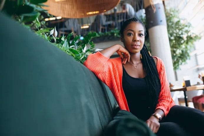African American woman in a cafe, work life balance and mental health, benefits of good work life balance, companies with the best work life balance, Work life examples, Work-life examples, Work life integration examples, Work-life integration examples,